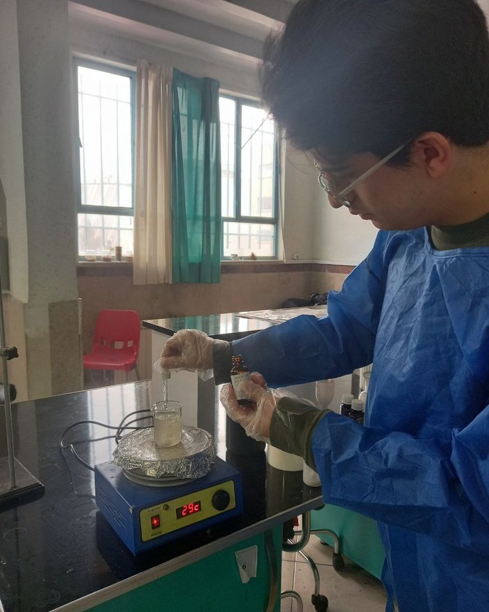 Raman Nafarieh combining formulation components on a heated magnetic stirrer